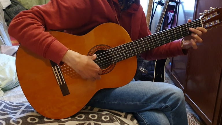 Cort AC100 vs Yamaha C40